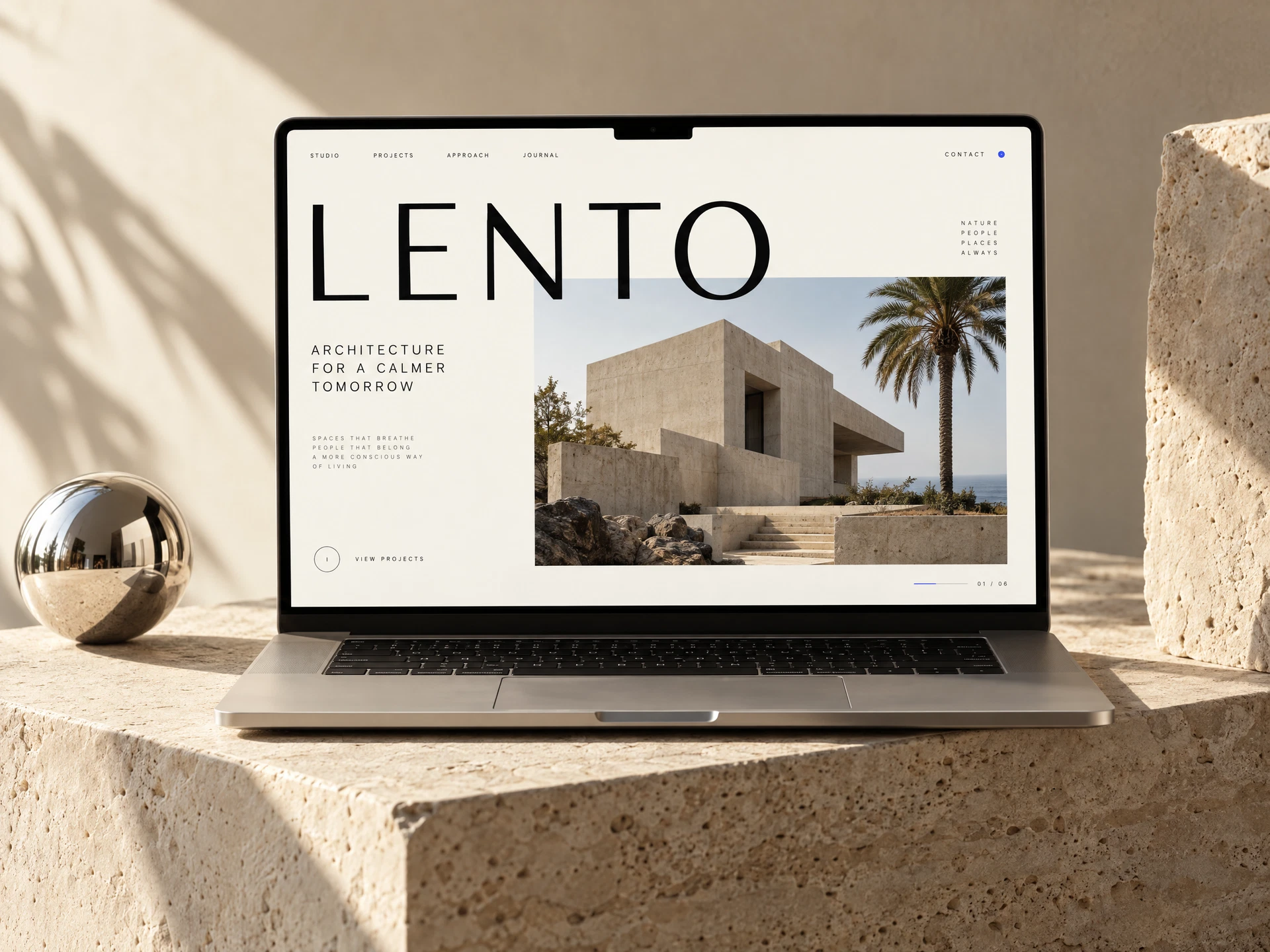 Concepto LENTO: web de arquitectura minimalista presentada en un portátil sobre piedra natural